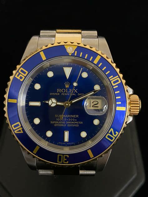 rolex 16618 submariner|Rolex 16618 gold submariner blue.